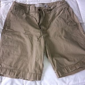3 pair shorts 1-tan A&E large, 2-plaid adidas large, 3-blue Nike large.